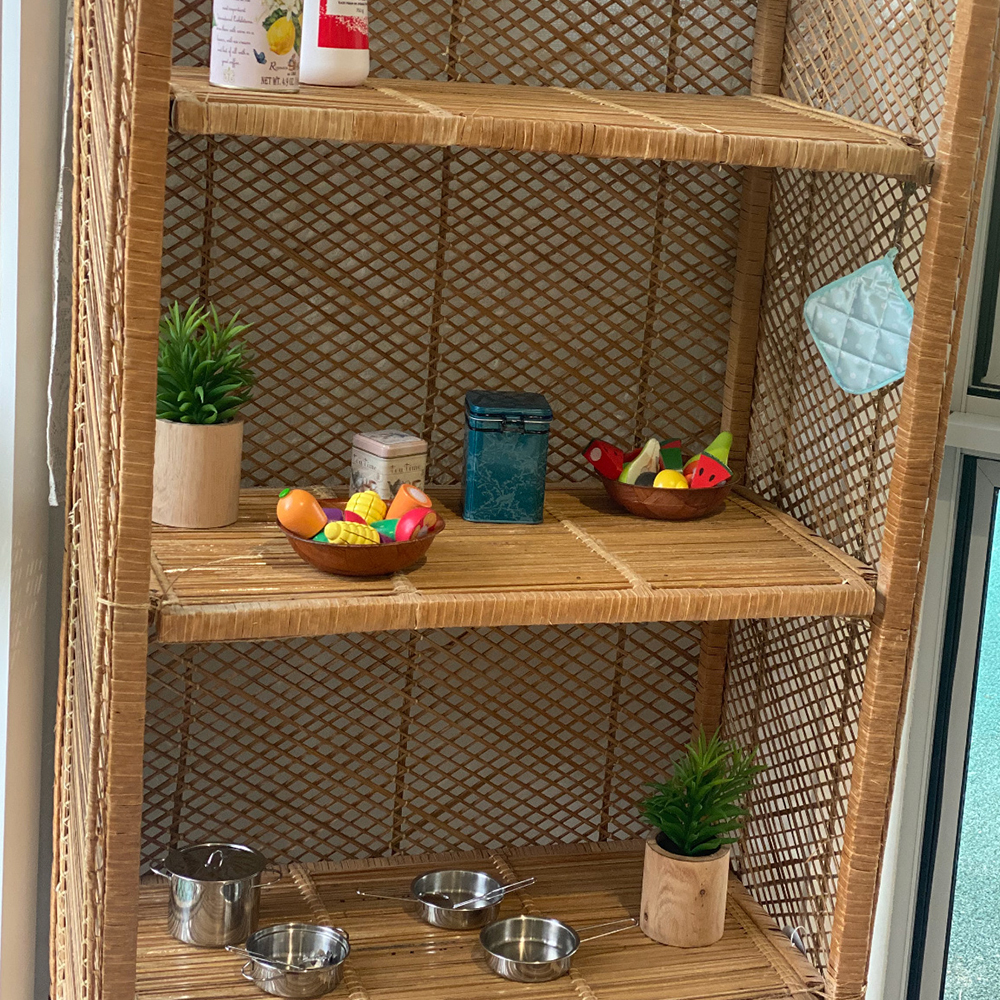 Shelf with fruit and cookware